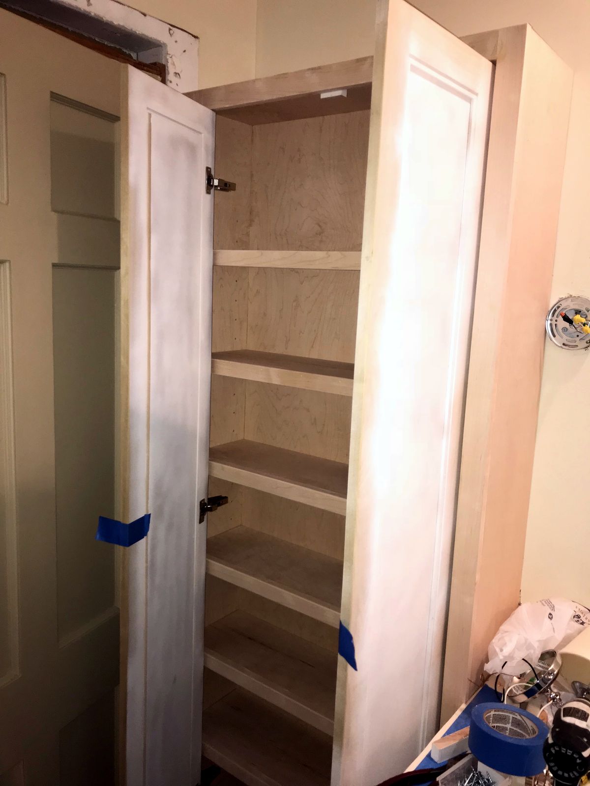 Pantry shelving under construction